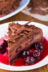 Chocolate mousse cake with dark cherries