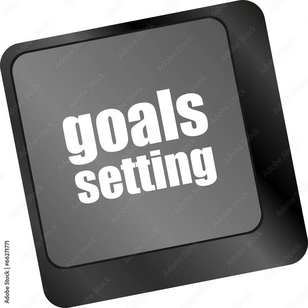 Poster goals setting button on keyboard with soft focus