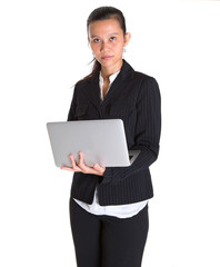 Asian businesswoman with laptop over white background