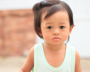 Naklejka premium Little Asian girl