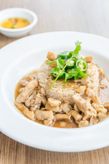 Chicken with brown sauce on rice