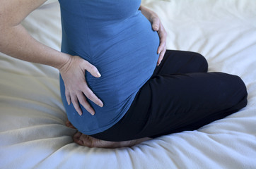 Obraz na płótnie Canvas Pregnancy - pregnant woman health care