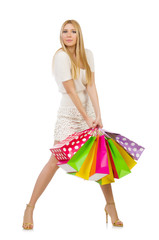 Woman with shopping bags isolated on white