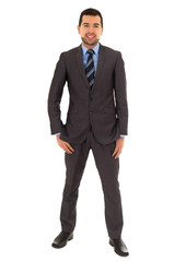 hispanic man standing in a suit