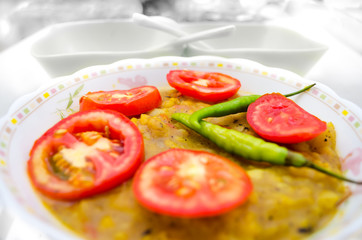 indian potato curry served decorated