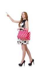 Woman with shopping bags isolated on white