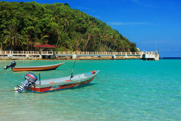 Serene view of the speedboats on the beach, Perhentian Island,