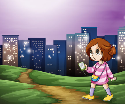 A young girl walking across the tall buildings