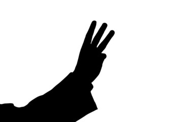 man's hand showing three black