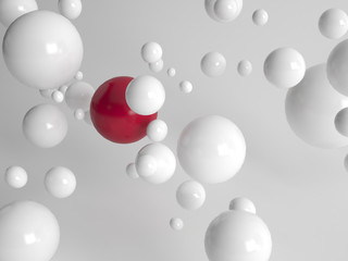Single red ball amongst floating white balls