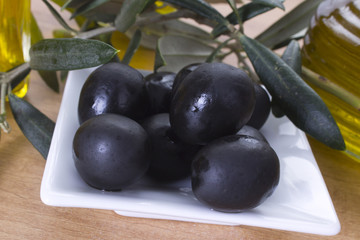 olives with wooden background