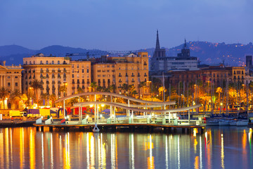 Port Vell and Barcelona cityspace in dawn