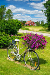 Flower bicycle on Swedish garden