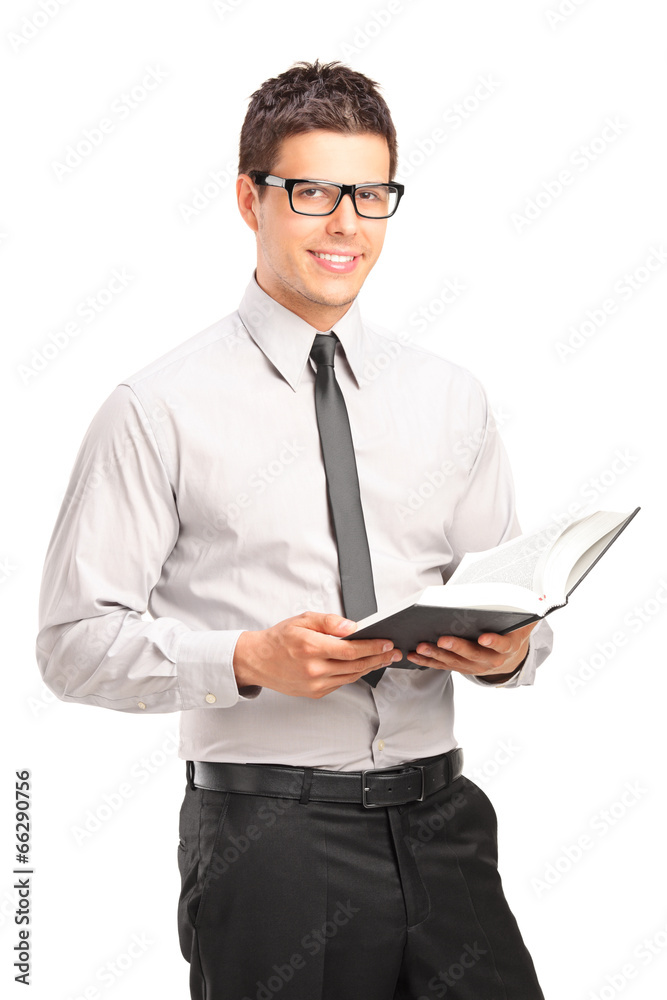 Sticker Handsome young man holding a book