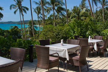 Table and chairs with a beautiful sea view, Thailand.
