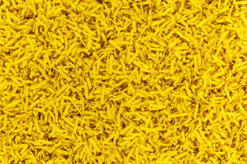 Papierstreifen gelb durcheinander Hintergrund