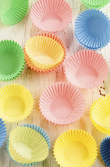 pastel colored empty cupcake cases