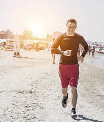 man running on the beach