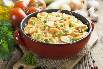 Squash baked with tomato and cheese