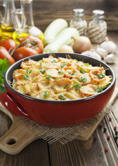 Squash baked with tomato and cheese
