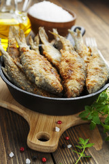Fried fish in a frying pan