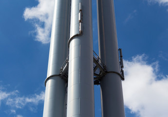 Factory  against the sky in the sunlight