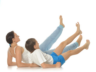 Obraz na płótnie Canvas Mother and son exercising