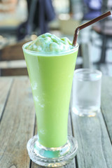 Ice Green tea with a straw