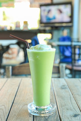 Ice Green tea with a straw