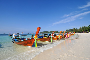 The boat on white sand beach of Lipe island, Thailand