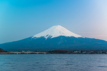 Fototapeta na wymiar Mt Fuji rises above Lake Kawaguchi