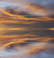 Reflection of dramatic and colorful clouds