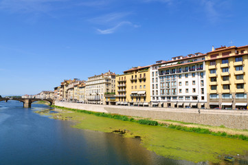 Fototapeta na wymiar Old City and the Arno river - Historic centre of Florence in Ita