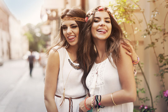 Funny faces of hippie female friends