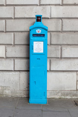 Old fashioned blue police telephone box, London.