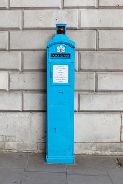 Old fashioned blue police telephone box, London.