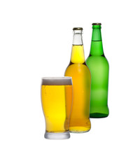Glass and bottles of cider isolated on a white background