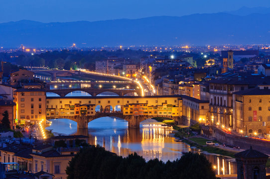 Ponte Vecchio - Historic centre of Florence at dusk in Italy