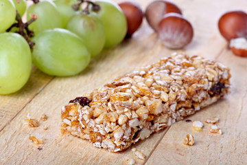 Cereal bar with grapes and hazelnuts