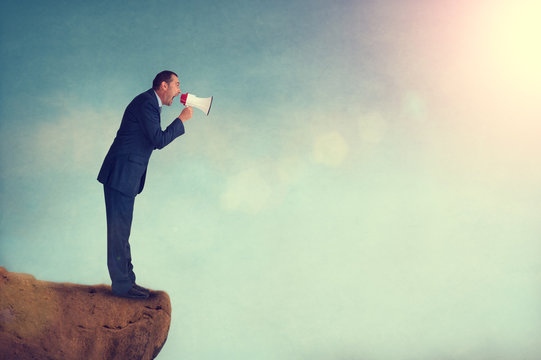 businessman megaphone - Powered by Adobe