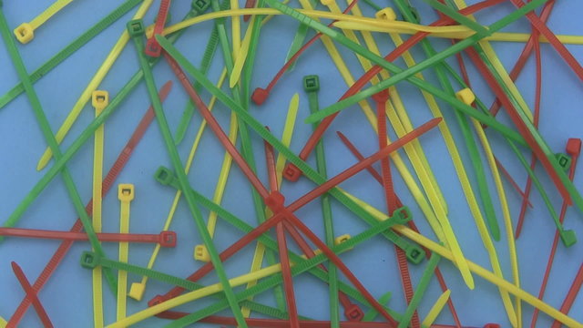 Cable ties or ny-lock on a blue background.