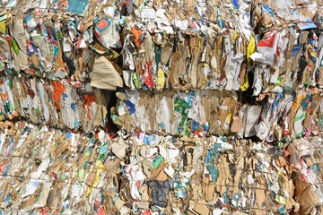 Paper and cardboard compressed for recycling