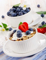 Muesli and yogurt with fresh berries.