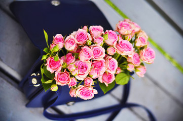 roses in a handbag