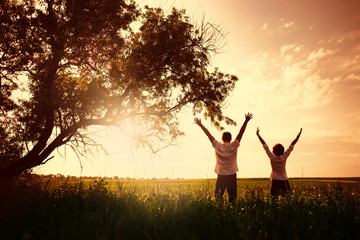 Happy couple outdoor, summertime, tinted photo