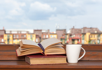 Books and a coffee cup