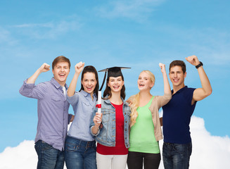 group of standing smiling students with diploma