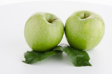 Two fresh green apples