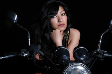 Fototapeta na wymiar beautiful girl on motorbike