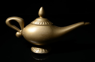 Magic lamp isolated on black
